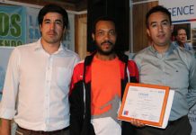 Con apoyo de Codelco Andina vecinos haitianos de Huertos Familiares aprenden español