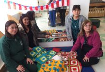 Tejedoras de Concón regalan coloridas mantas para lactantes de nuevo jardín infantil de la JUNJI