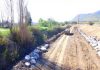 Obras de construcción de muro de enrocado del estero Pocuro presentan un 45 por ciento de avance